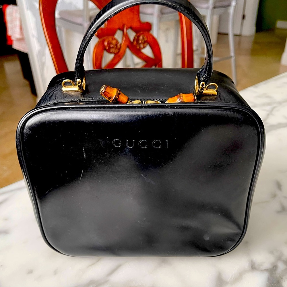 Gucci bag with Iconic bamboo pulls. Lining has been replaced. Priced to sell.